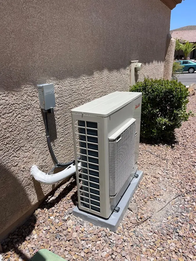 Residential air conditioning condenser unit in Richland